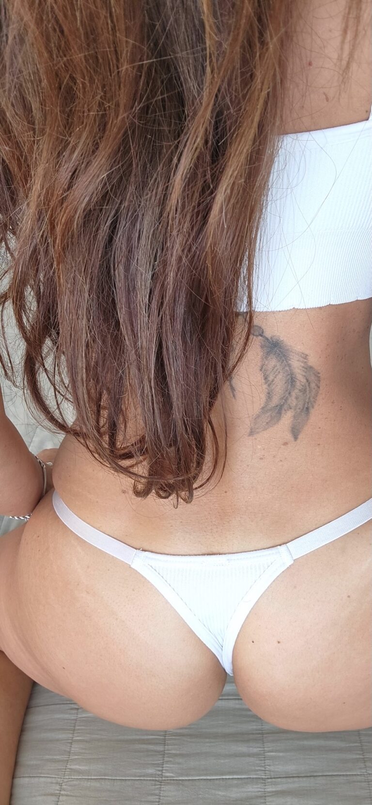 Angelina showing her behind and butt